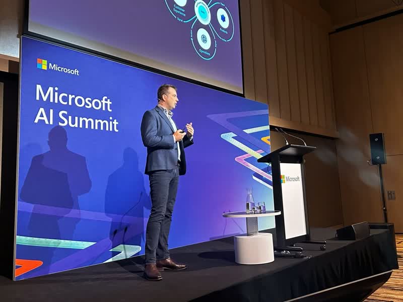 Hypergen team collaborating on AI strategy in a courtyard setting