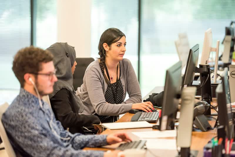 Call centre operator wearing a headset, representing AI-enhanced customer service